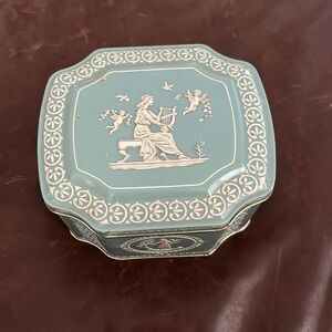 Antique tin box of various buttons